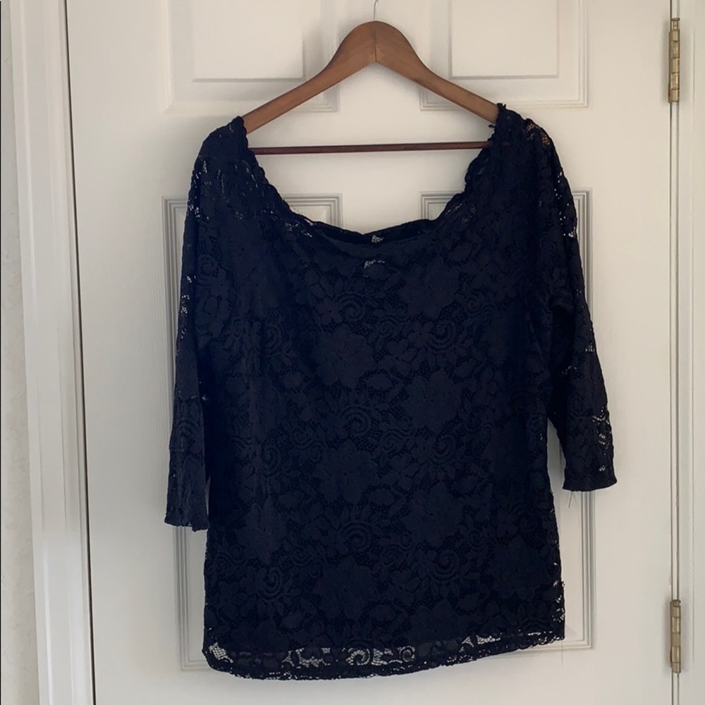 Maurice’s black lacy top